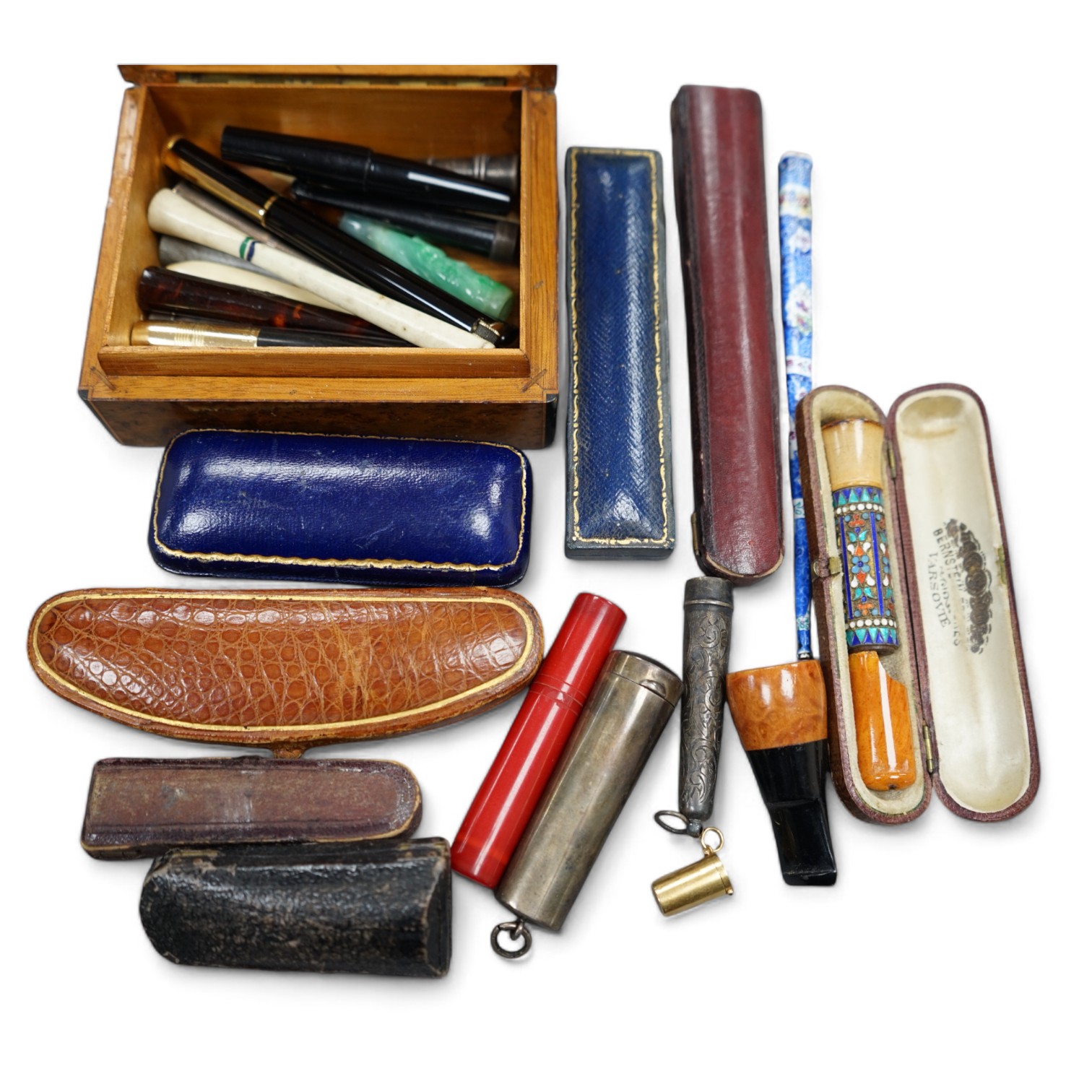 A group of assorted cigar and cheroot cigarette holders, some cased. Condition - fair